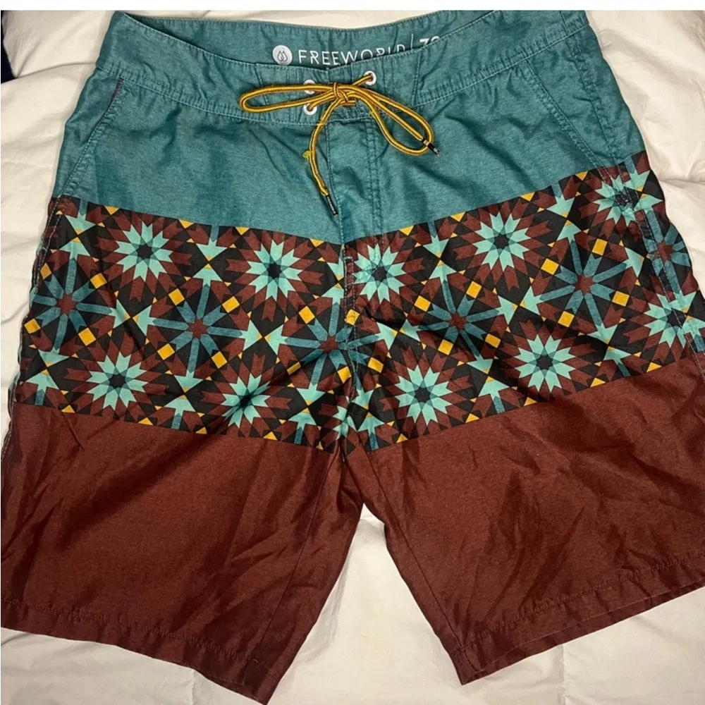 Men’s swim‎ suit size 32